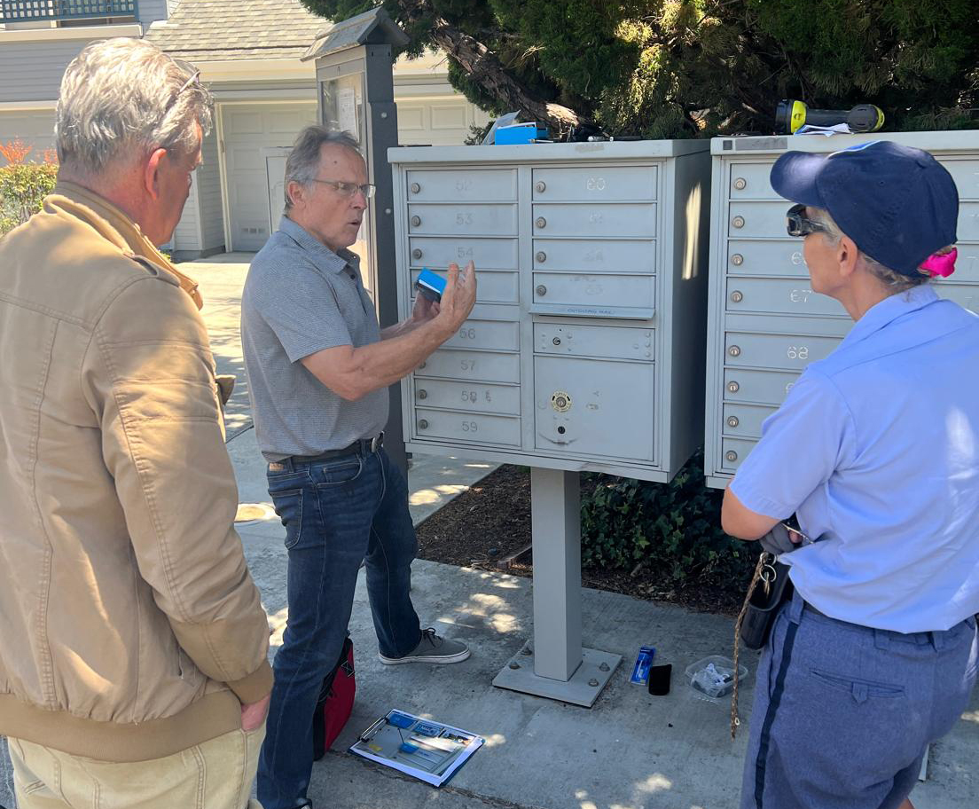 Mail carrier training at a Mailbox Protector installation